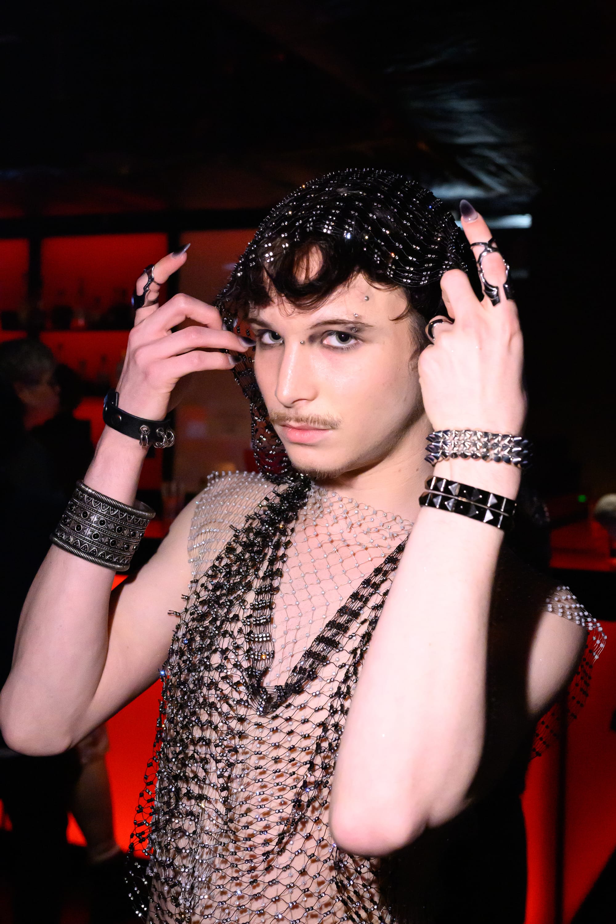 A raver in a diamanté shawl.