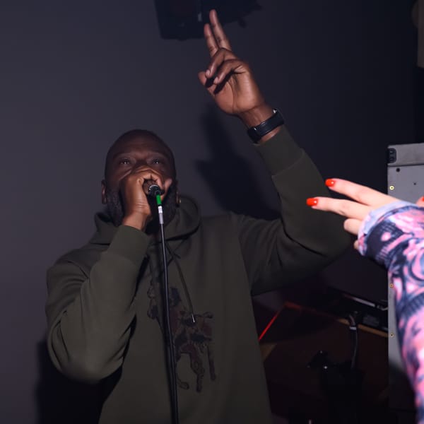 Flowdan with some gunfingers in the foreground.